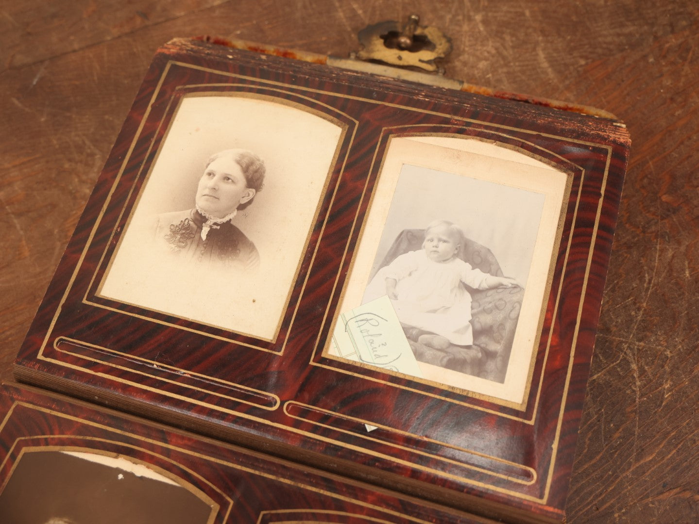 Lot 028 - Antique Family Photograph Album With Velvet Covering And Beveled Glass Heart Mirror, Containing 34 Cabinet Card Photos, 10 C.D.V.S, 1 Tintype, And 23 Paper Portrait Snapshots