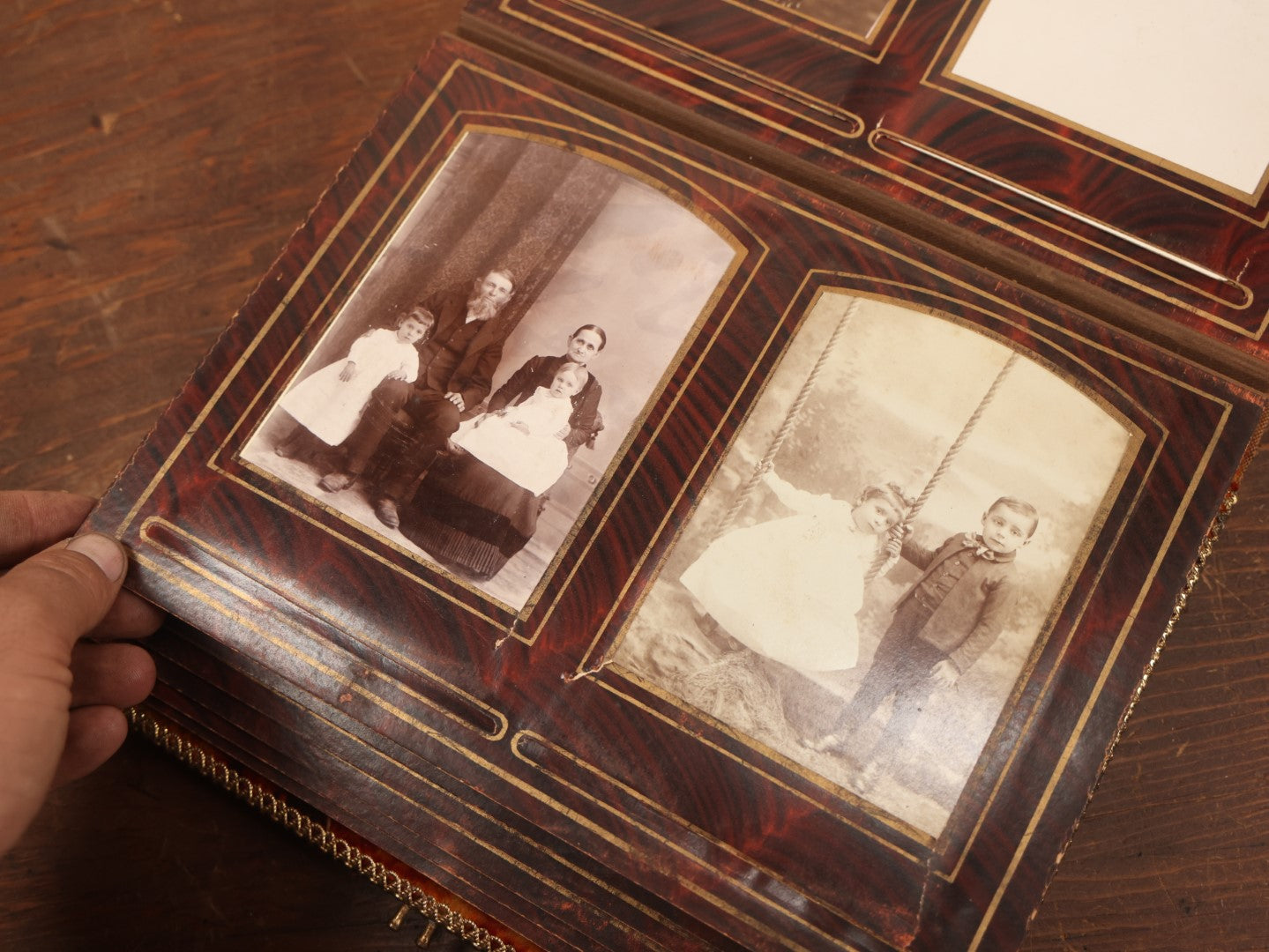 Lot 028 - Antique Family Photograph Album With Velvet Covering And Beveled Glass Heart Mirror, Containing 34 Cabinet Card Photos, 10 C.D.V.S, 1 Tintype, And 23 Paper Portrait Snapshots