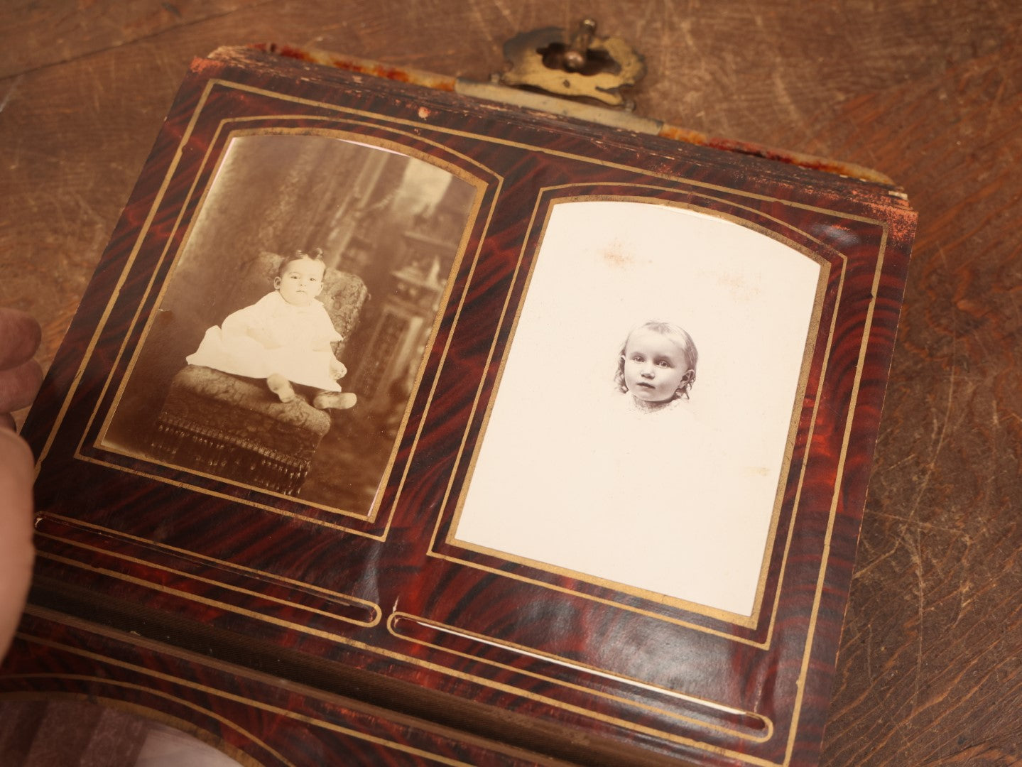 Lot 028 - Antique Family Photograph Album With Velvet Covering And Beveled Glass Heart Mirror, Containing 34 Cabinet Card Photos, 10 C.D.V.S, 1 Tintype, And 23 Paper Portrait Snapshots