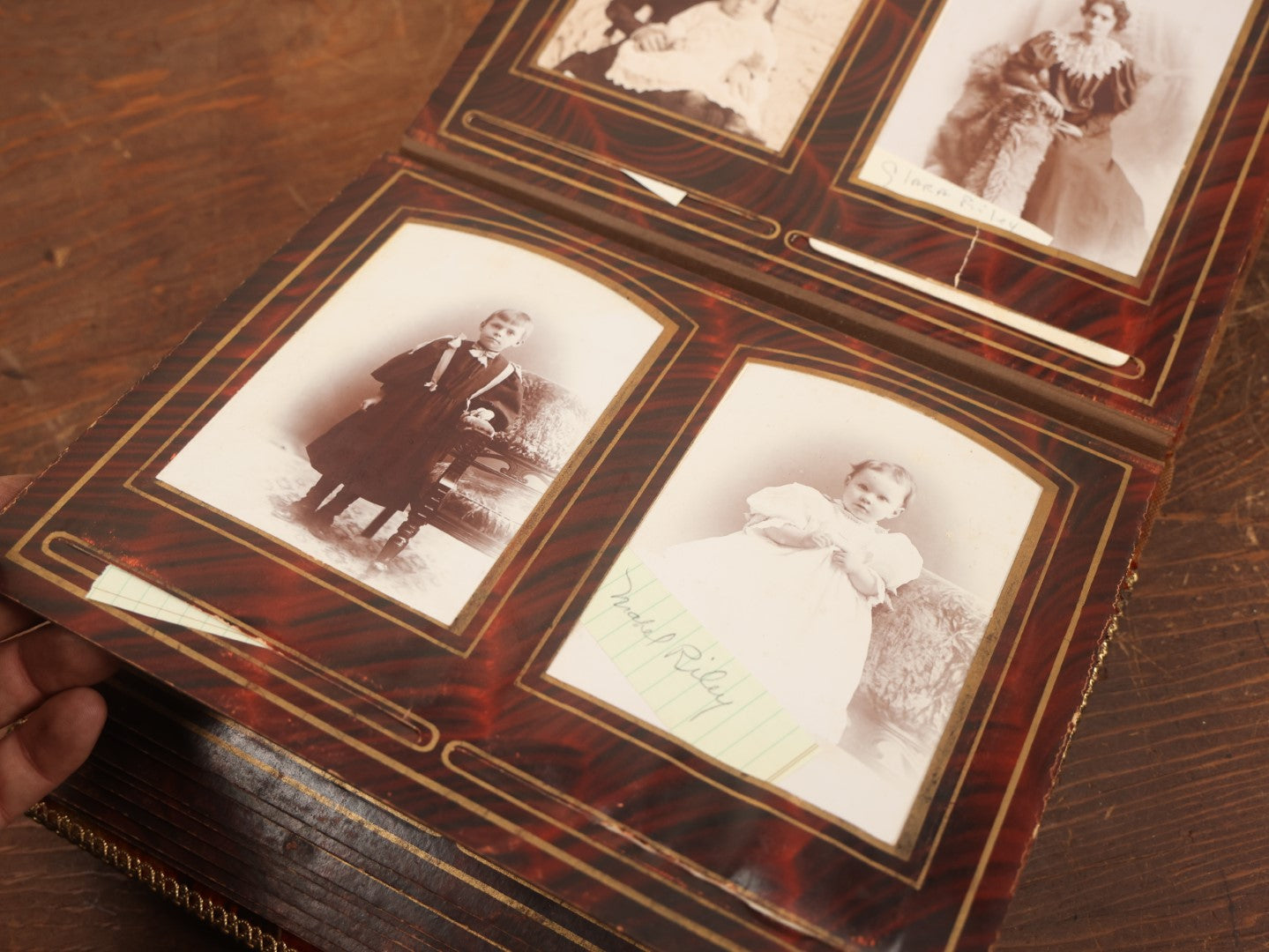 Lot 028 - Antique Family Photograph Album With Velvet Covering And Beveled Glass Heart Mirror, Containing 34 Cabinet Card Photos, 10 C.D.V.S, 1 Tintype, And 23 Paper Portrait Snapshots