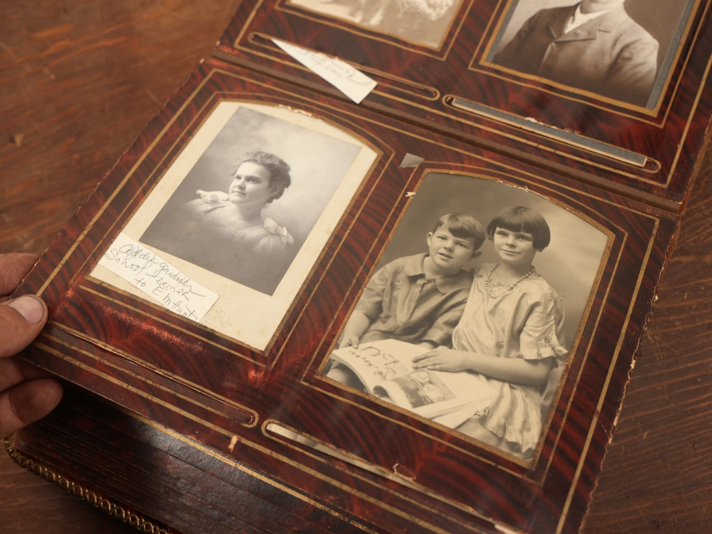 Lot 028 - Antique Family Photograph Album With Velvet Covering And Beveled Glass Heart Mirror, Containing 34 Cabinet Card Photos, 10 C.D.V.S, 1 Tintype, And 23 Paper Portrait Snapshots