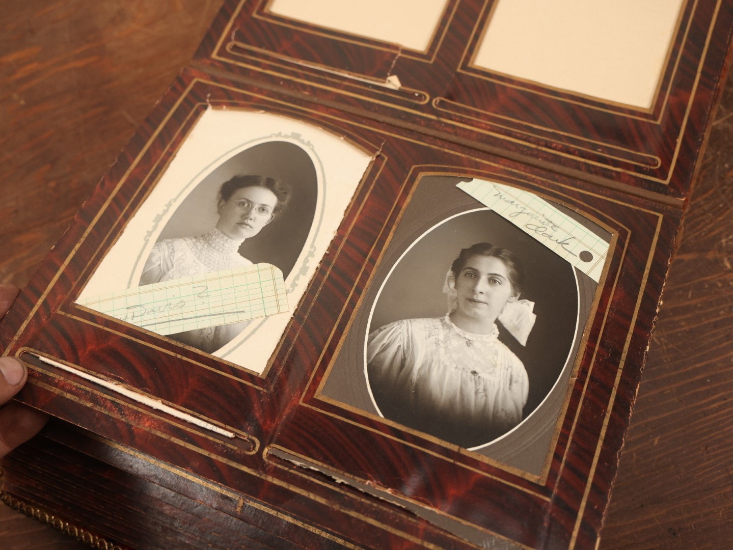 Lot 028 - Antique Family Photograph Album With Velvet Covering And Beveled Glass Heart Mirror, Containing 34 Cabinet Card Photos, 10 C.D.V.S, 1 Tintype, And 23 Paper Portrait Snapshots