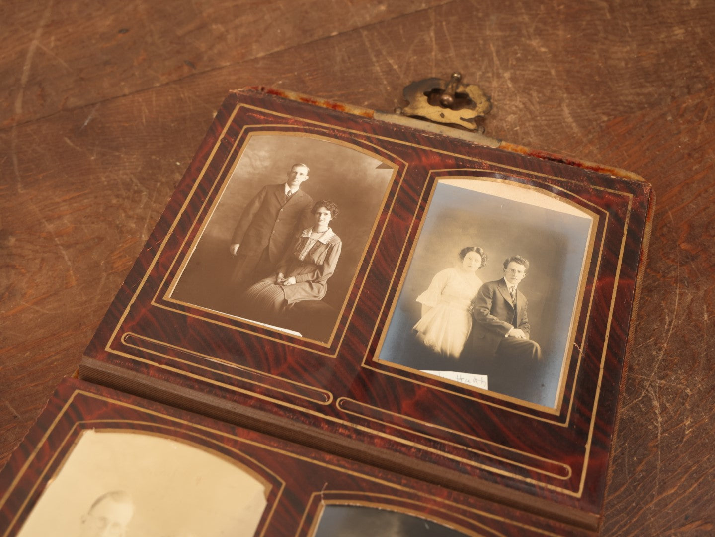 Lot 028 - Antique Family Photograph Album With Velvet Covering And Beveled Glass Heart Mirror, Containing 34 Cabinet Card Photos, 10 C.D.V.S, 1 Tintype, And 23 Paper Portrait Snapshots