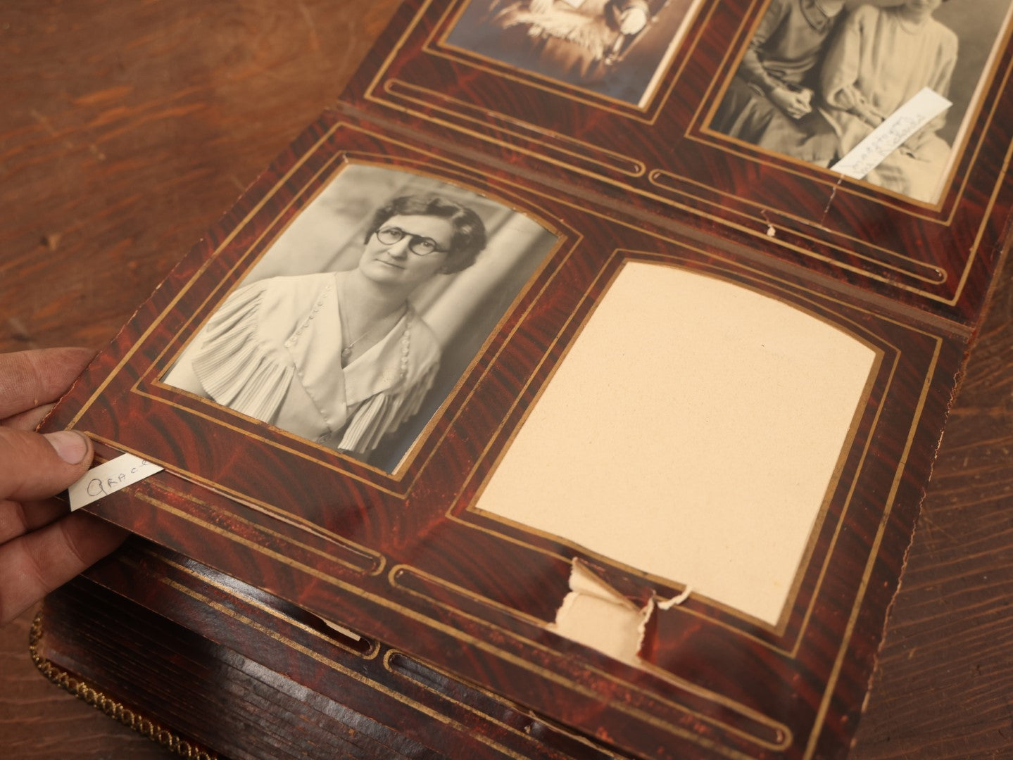 Lot 028 - Antique Family Photograph Album With Velvet Covering And Beveled Glass Heart Mirror, Containing 34 Cabinet Card Photos, 10 C.D.V.S, 1 Tintype, And 23 Paper Portrait Snapshots