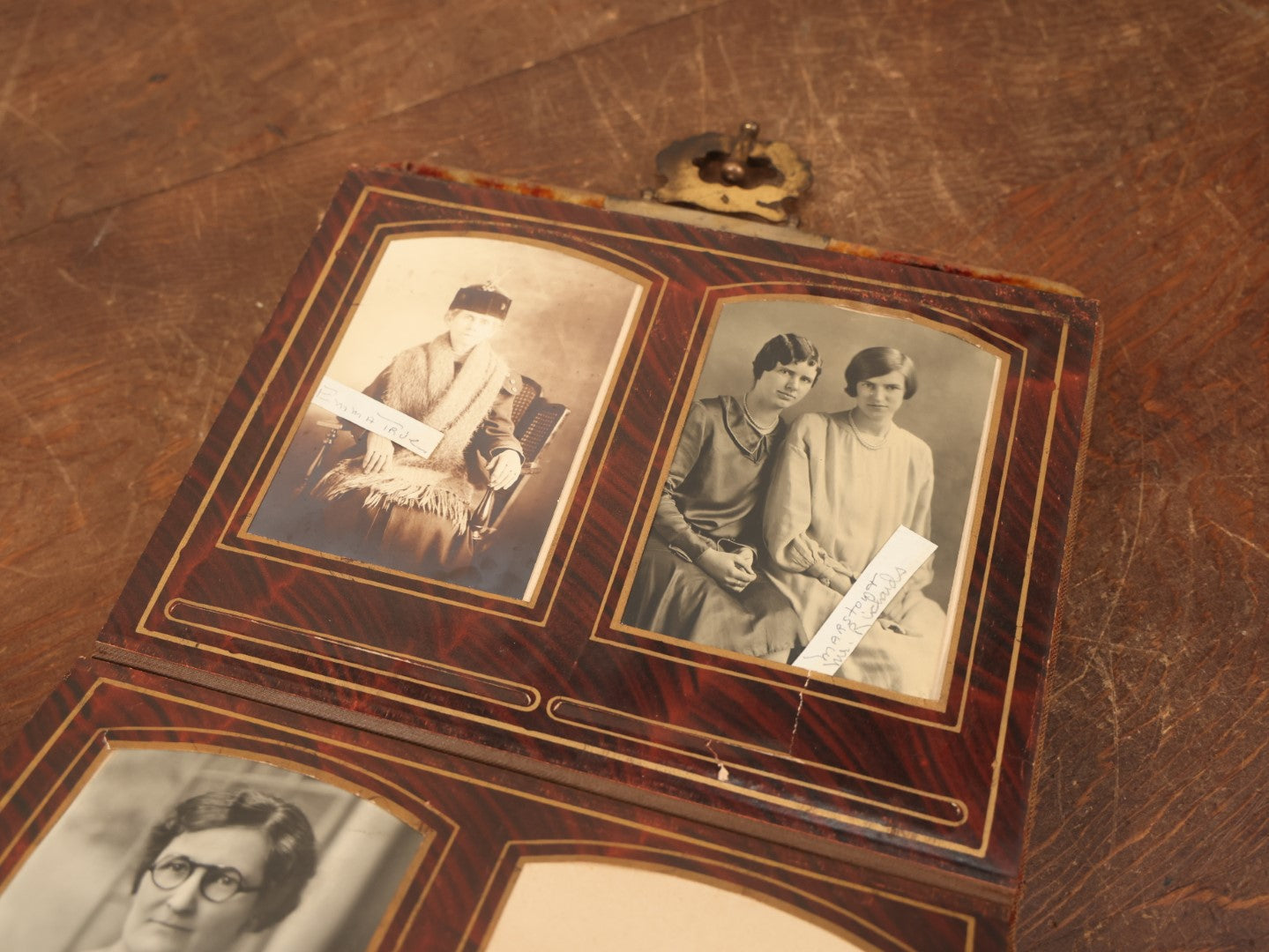 Lot 028 - Antique Family Photograph Album With Velvet Covering And Beveled Glass Heart Mirror, Containing 34 Cabinet Card Photos, 10 C.D.V.S, 1 Tintype, And 23 Paper Portrait Snapshots