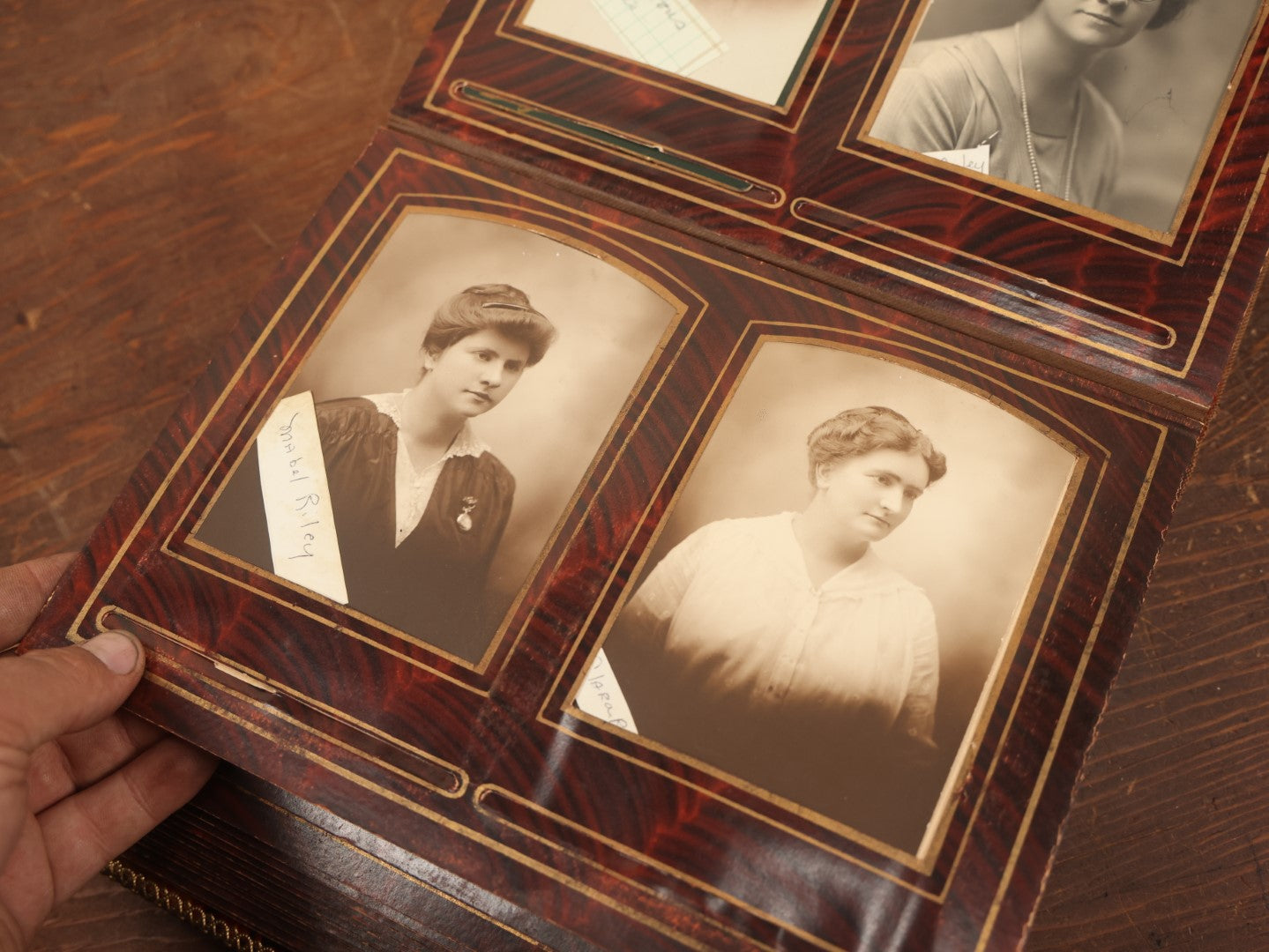 Lot 028 - Antique Family Photograph Album With Velvet Covering And Beveled Glass Heart Mirror, Containing 34 Cabinet Card Photos, 10 C.D.V.S, 1 Tintype, And 23 Paper Portrait Snapshots