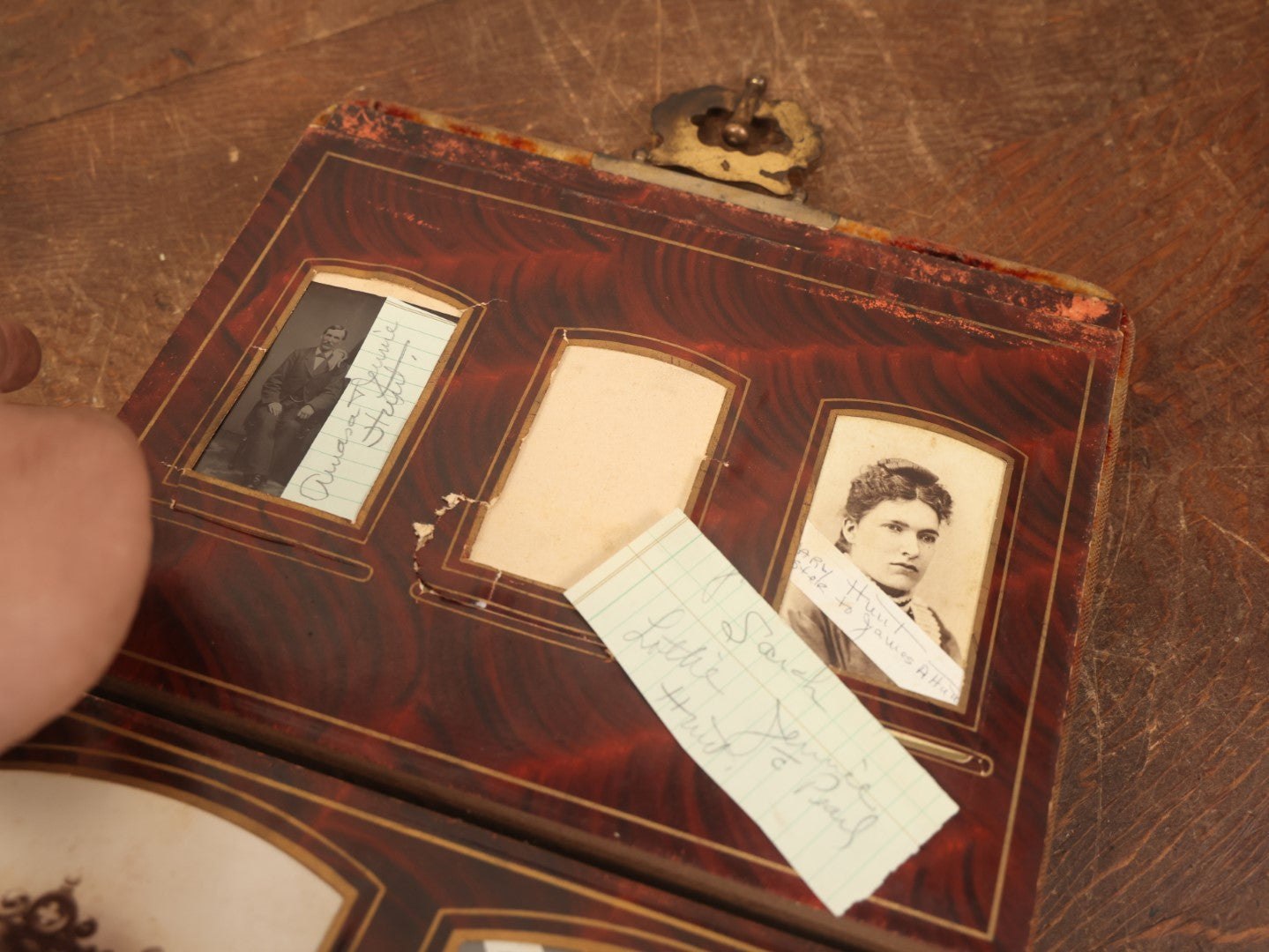 Lot 028 - Antique Family Photograph Album With Velvet Covering And Beveled Glass Heart Mirror, Containing 34 Cabinet Card Photos, 10 C.D.V.S, 1 Tintype, And 23 Paper Portrait Snapshots