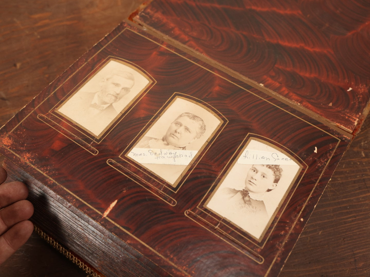 Lot 028 - Antique Family Photograph Album With Velvet Covering And Beveled Glass Heart Mirror, Containing 34 Cabinet Card Photos, 10 C.D.V.S, 1 Tintype, And 23 Paper Portrait Snapshots