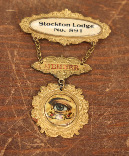 Lot 039 - Antique Odd Fellows I.O.O.F. Metal Member Badge, Stockton Lodge No. 81 With All Seeing Eye, Three Links, F.L.T., By The M.C. Lilley & Co., Columbus, Ohio