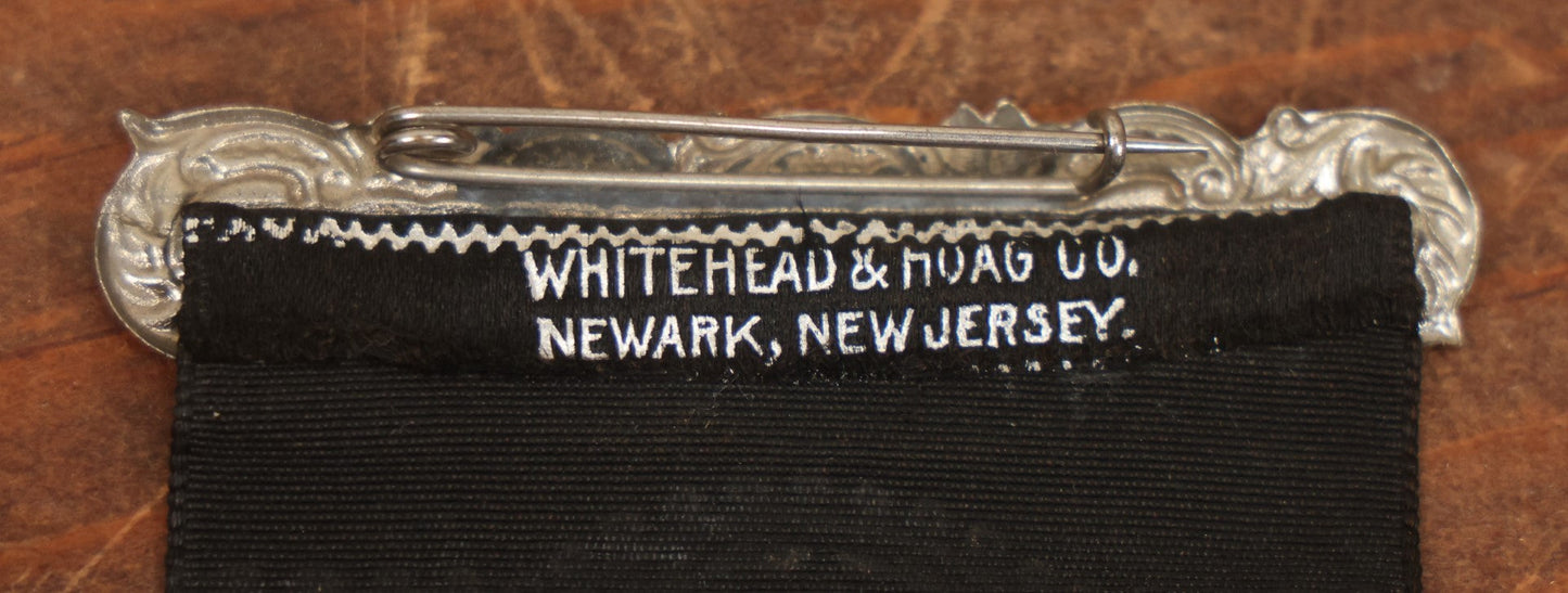 Lot 040 - Antique Odd Fellows I.O.O.F. Veteran Odd Fellows Association Ribbon And Badge, Sacramento, 1883, With All Seeing Eye, Three Links, F.L.T., By The Whitehead & Hoag Co., Newark, New Jersey