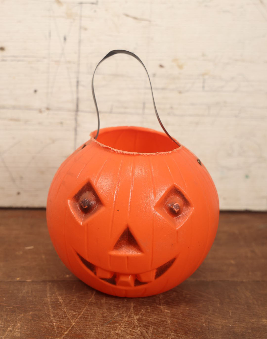 Lot 043 - Vintage Halloween Pumpkin Jack-O-Lantern J.O.L. Blow Mold Candy Bucket With Handle - Lighter Black Face