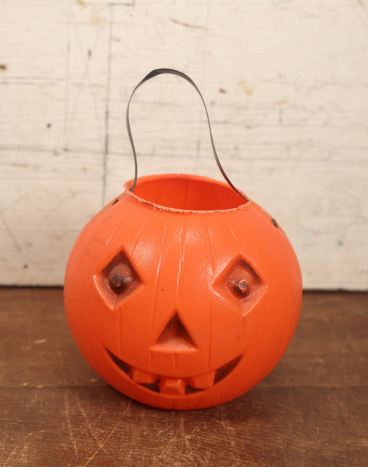 Lot 043 - Vintage Halloween Pumpkin Jack-O-Lantern J.O.L. Blow Mold Candy Bucket With Handle - Lighter Black Face