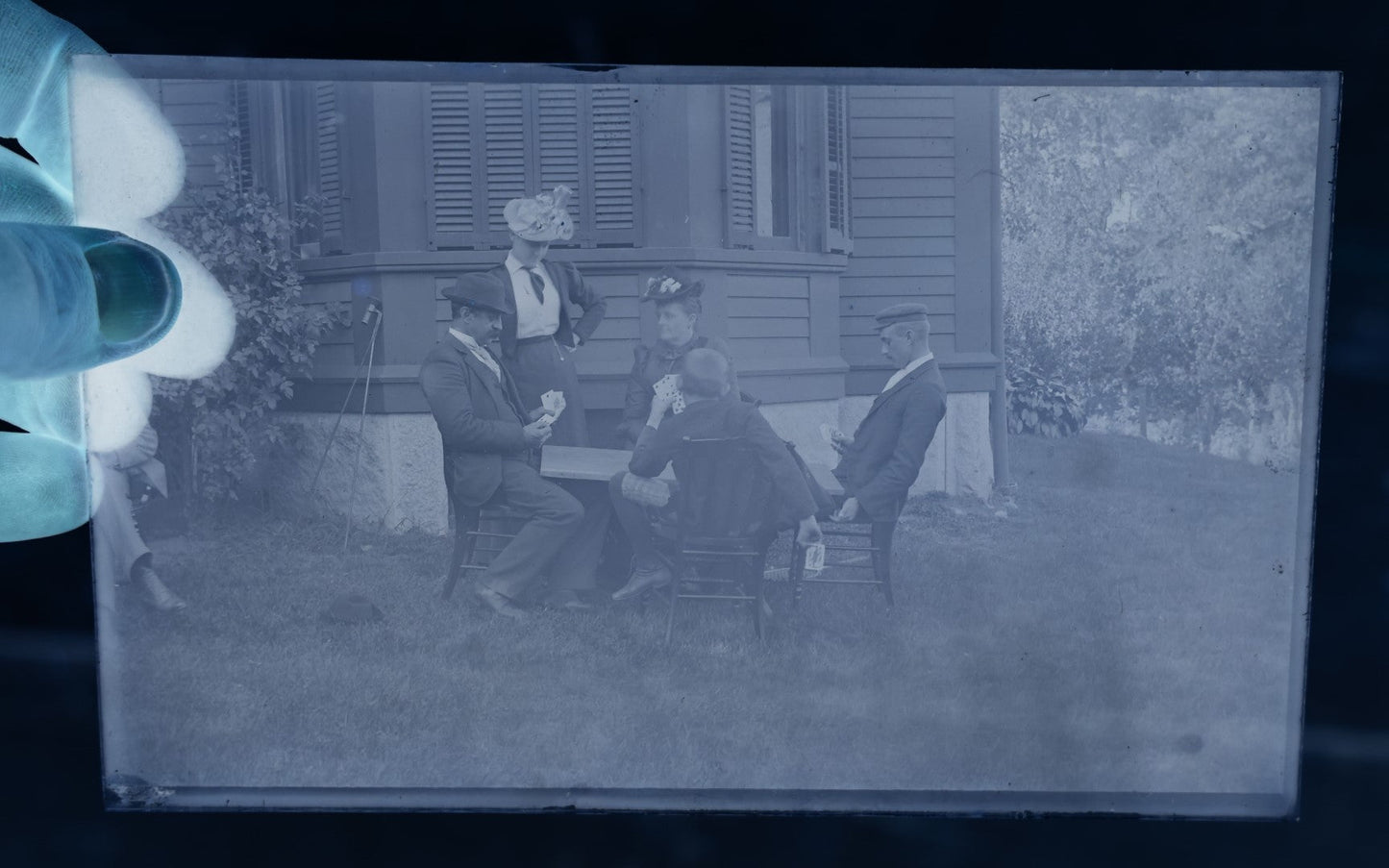 Lot 064 - Antique Glass Photo Negative, Single, Of A Group Of Men And Women Playing Cards Outdoors, Likely From Or Around Mendon, Massachusetts, New England, Circa 1900