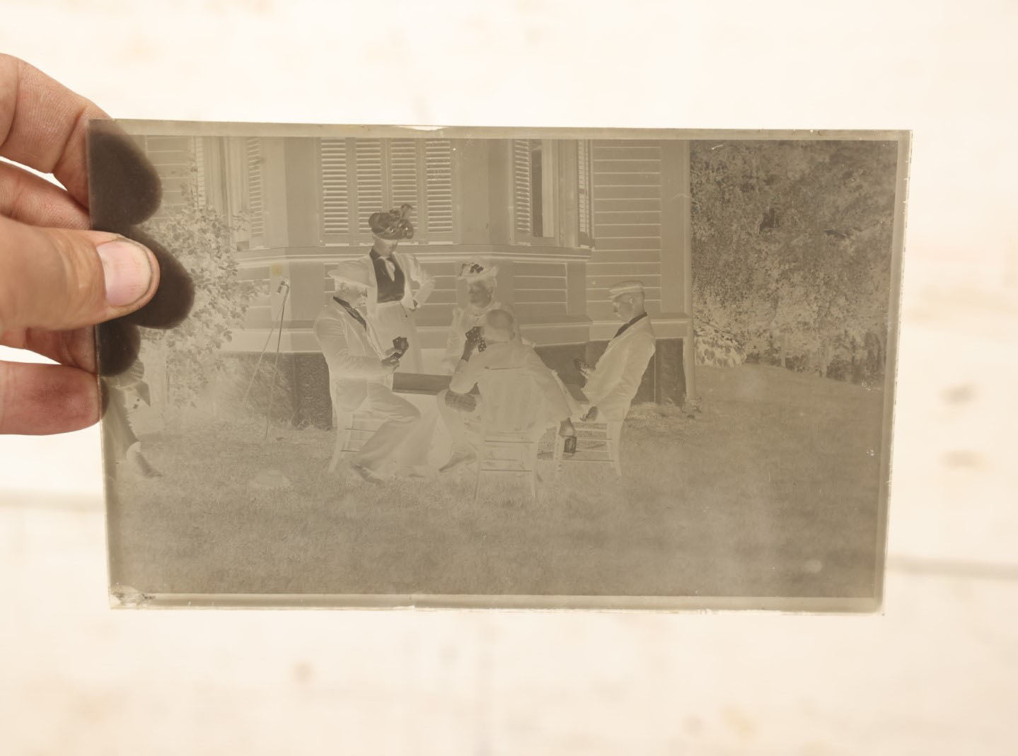 Lot 064 - Antique Glass Photo Negative, Single, Of A Group Of Men And Women Playing Cards Outdoors, Likely From Or Around Mendon, Massachusetts, New England, Circa 1900