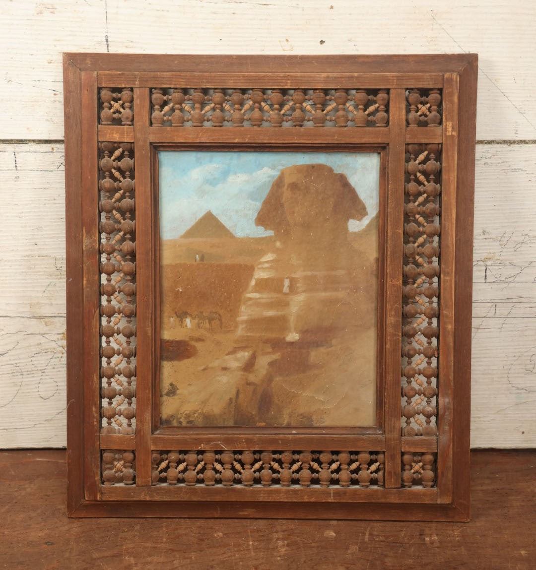 Lot 080 - Antique Painted Over Photo Of Egypt, Sphinx, And Pyramids, On Canvas In Carved Wooden Frame, Note Various Wear, Holes