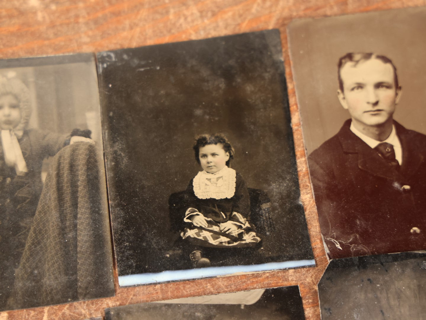 Lot 087 - Grouping Of Nine Antique Tintype Photographs Of Children, Women, And Men