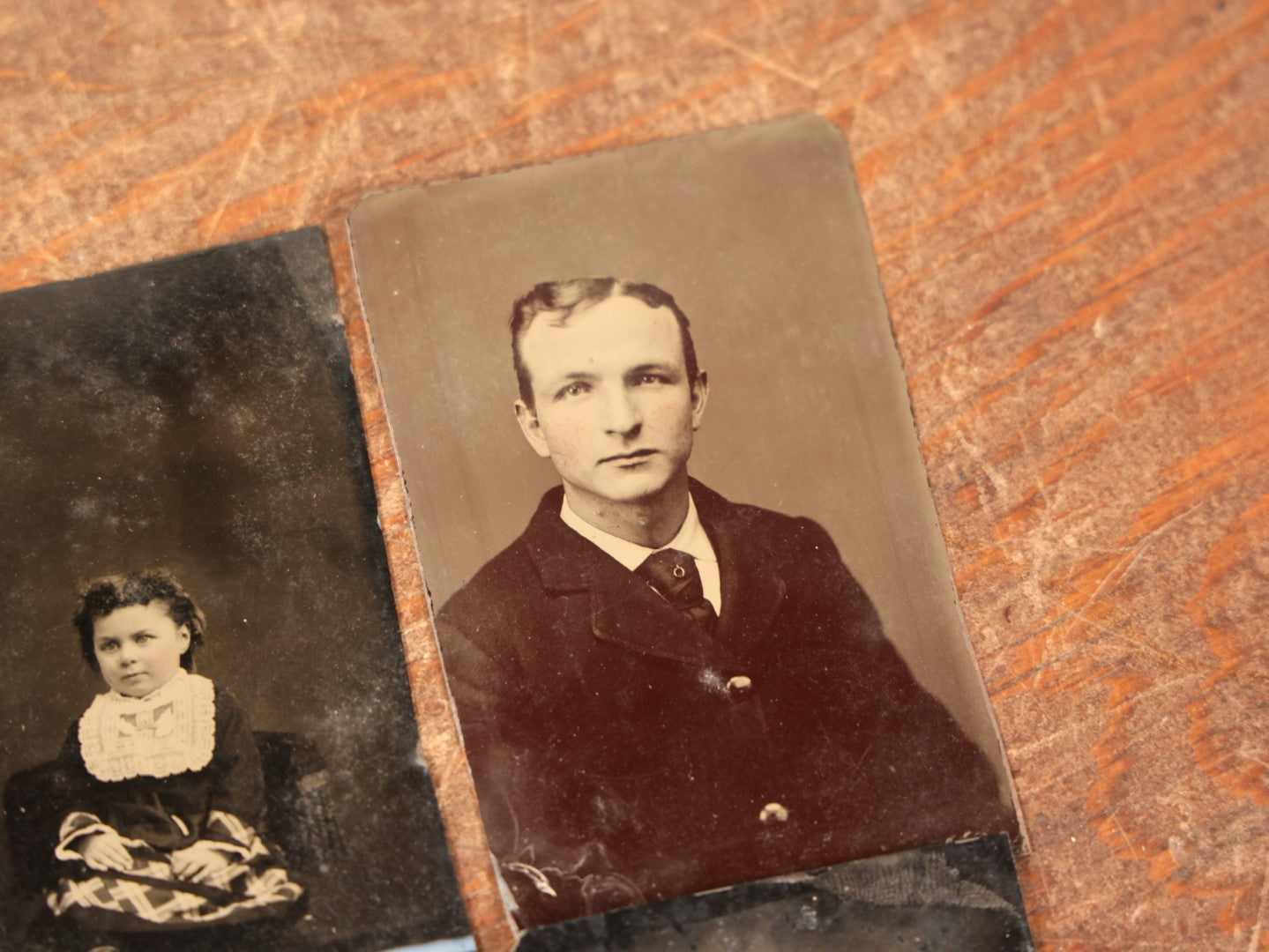 Lot 087 - Grouping Of Nine Antique Tintype Photographs Of Children, Women, And Men