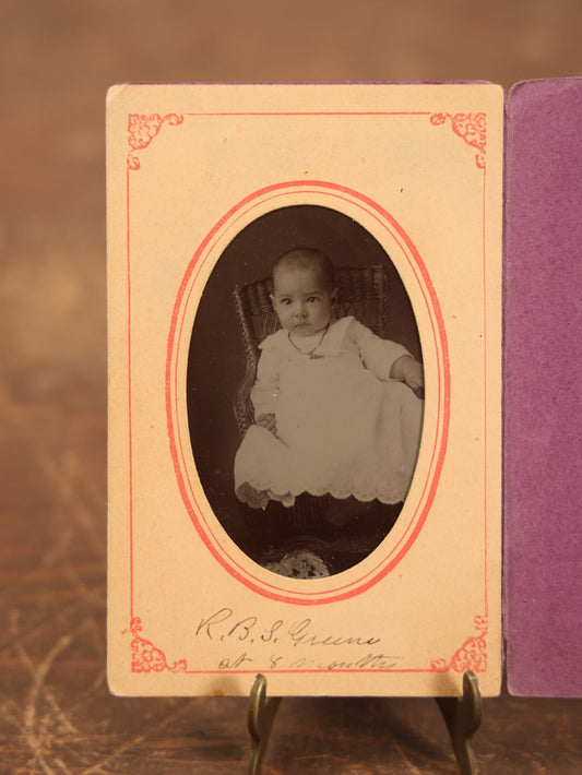 Lot 094 - Single Tintype Photo, Baby Identified As R.B.S. Greene At 8 Months Old, In Paper Folder, Kenefick Lawrence Photographers