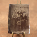 Lot 100 - Single Tintype Photo, Two Men And Two Women, Sitting And Standing, With Drapery