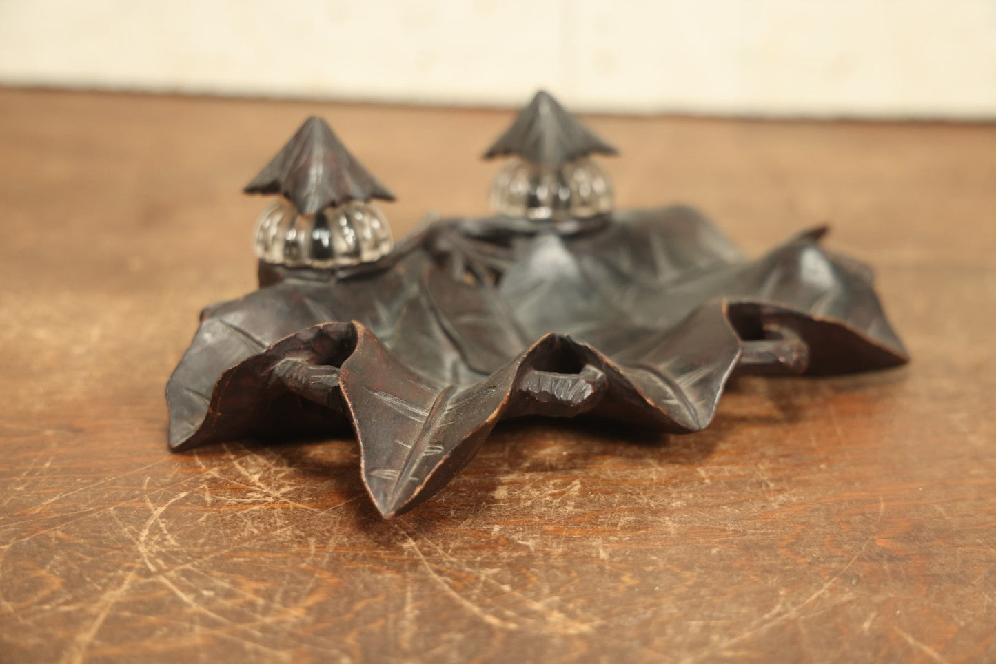 Lot 004 - Antique Inkwell Carved Out Of A Single Piece Of Wood With Natural Leaf Motif, Two Glass Inserts, With Matching Caps