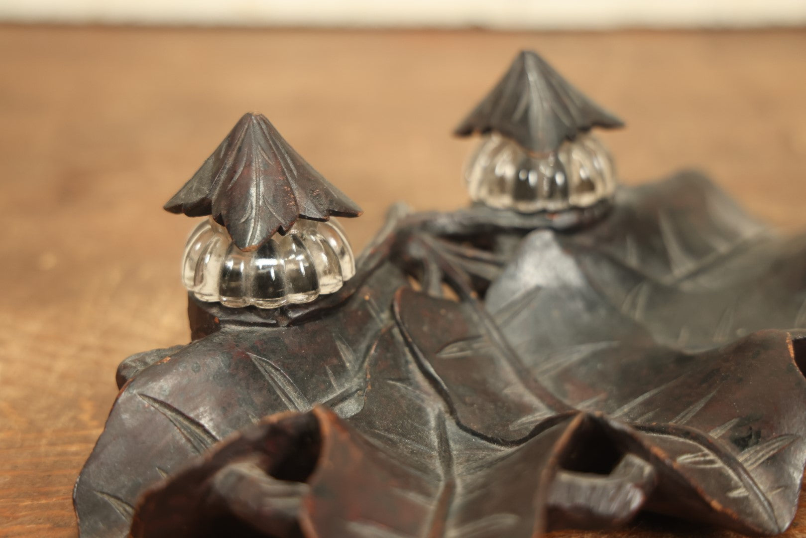 Lot 004 - Antique Inkwell Carved Out Of A Single Piece Of Wood With Natural Leaf Motif, Two Glass Inserts, With Matching Caps