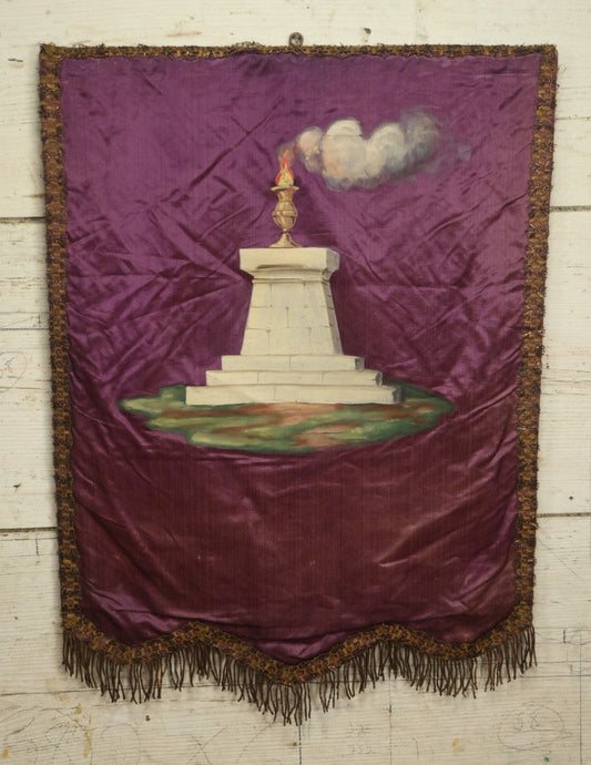 Lot 011 - Antique Independent Order Of Odd Fellows I.O.O.F. Hand Painted Encampment Banner - Pedestal With Fire On Purple Background - 18" x 23"