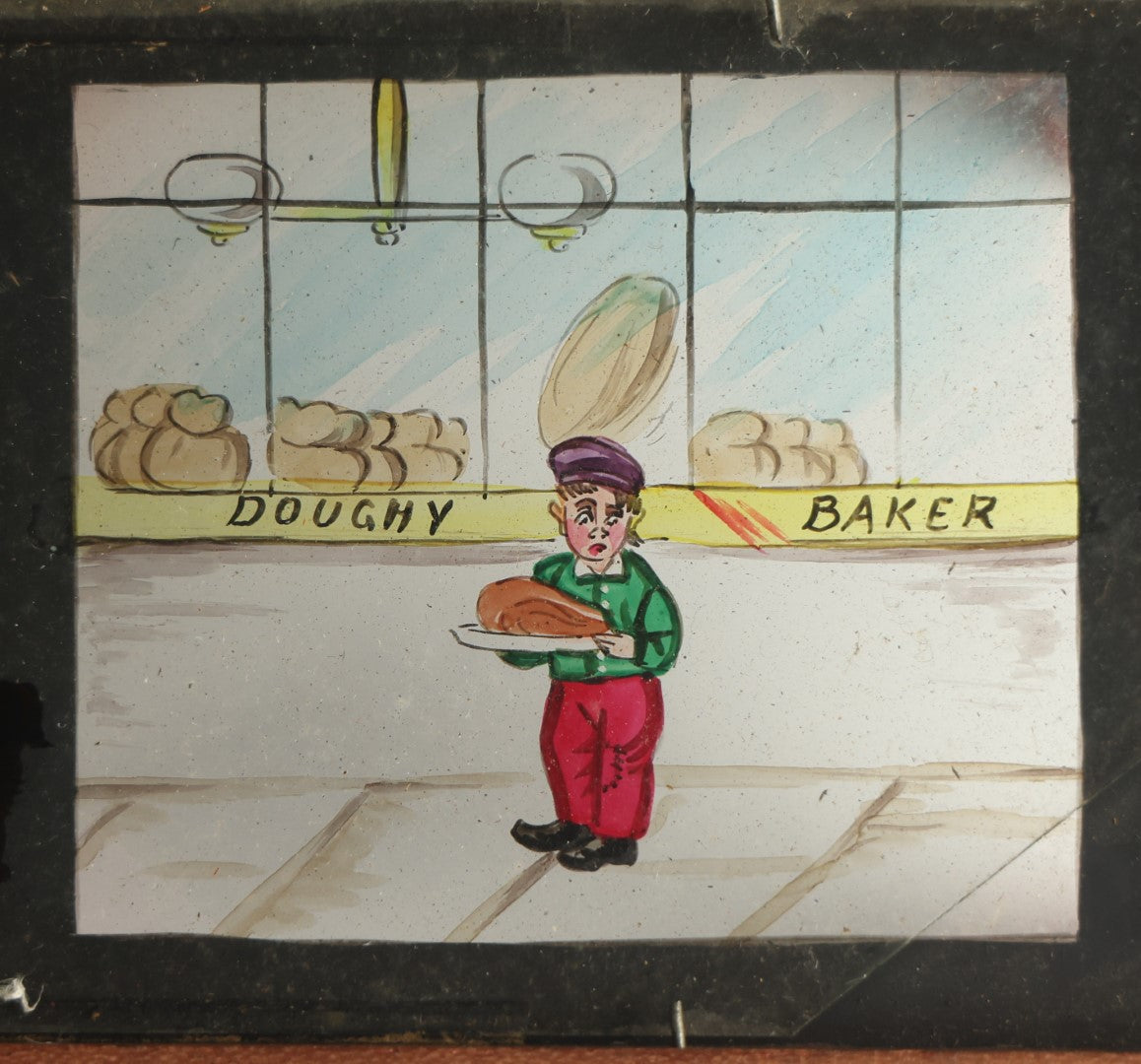 Lot 041 - Antique Hand Painted Animated Magic Lantern Motion Slide, Young Boy With Chicken Outside Bakery Surrounded By Dogs, Dogs Slide In From Both Sides