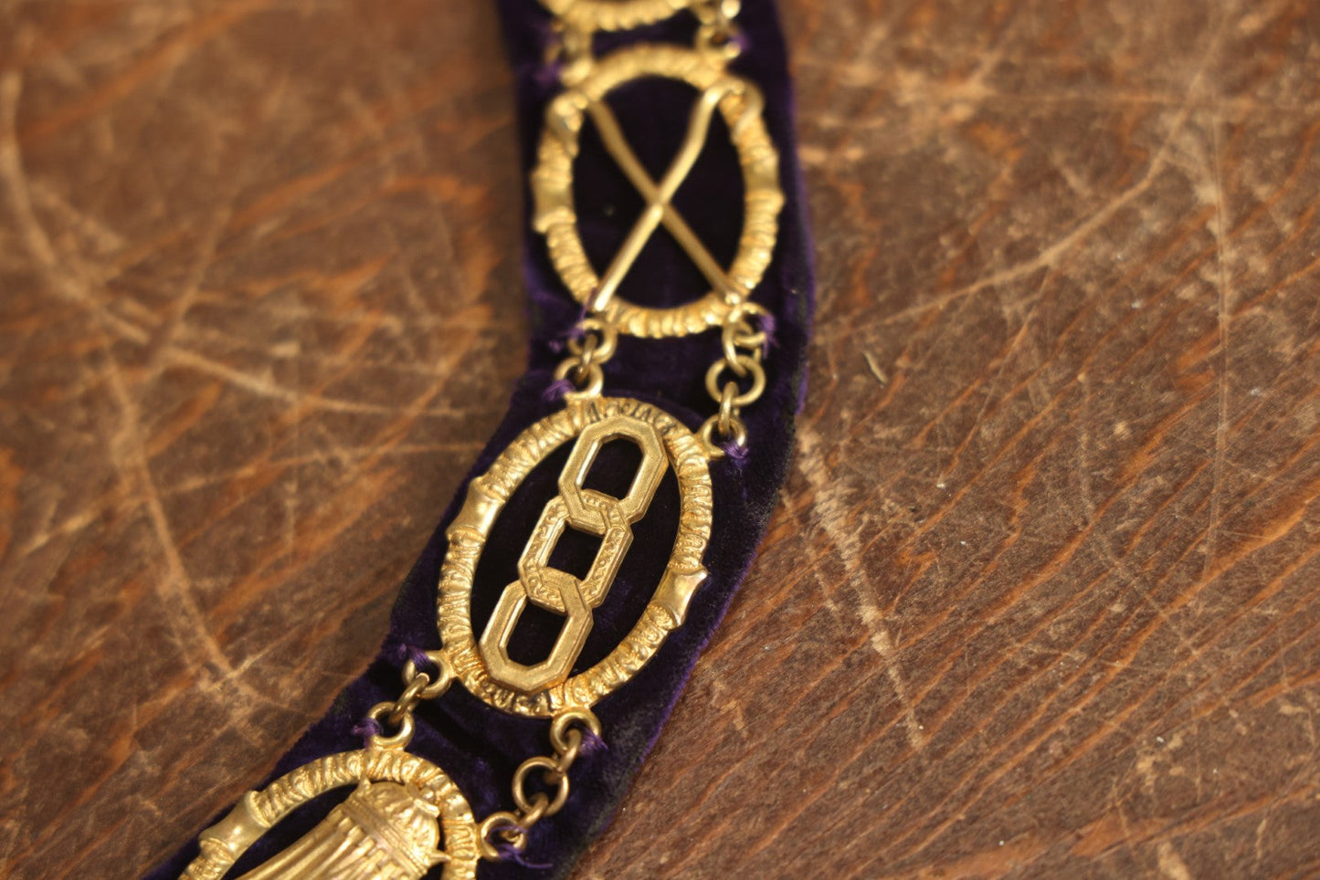 Lot 052 - Antique Odd Fellows I.O.O.F. Purple Chain Collar With Many Symbols Including Three Links And Heart In Hand, With Crossed Swords Medallion, By Harding Uniform & Regalia Company, Boston