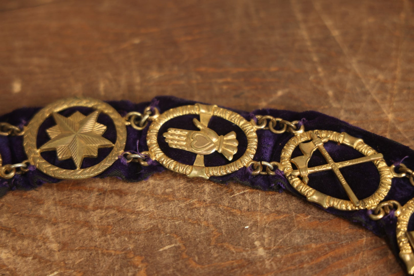 Lot 052 - Antique Odd Fellows I.O.O.F. Purple Chain Collar With Many Symbols Including Three Links And Heart In Hand, With Crossed Swords Medallion, By Harding Uniform & Regalia Company, Boston