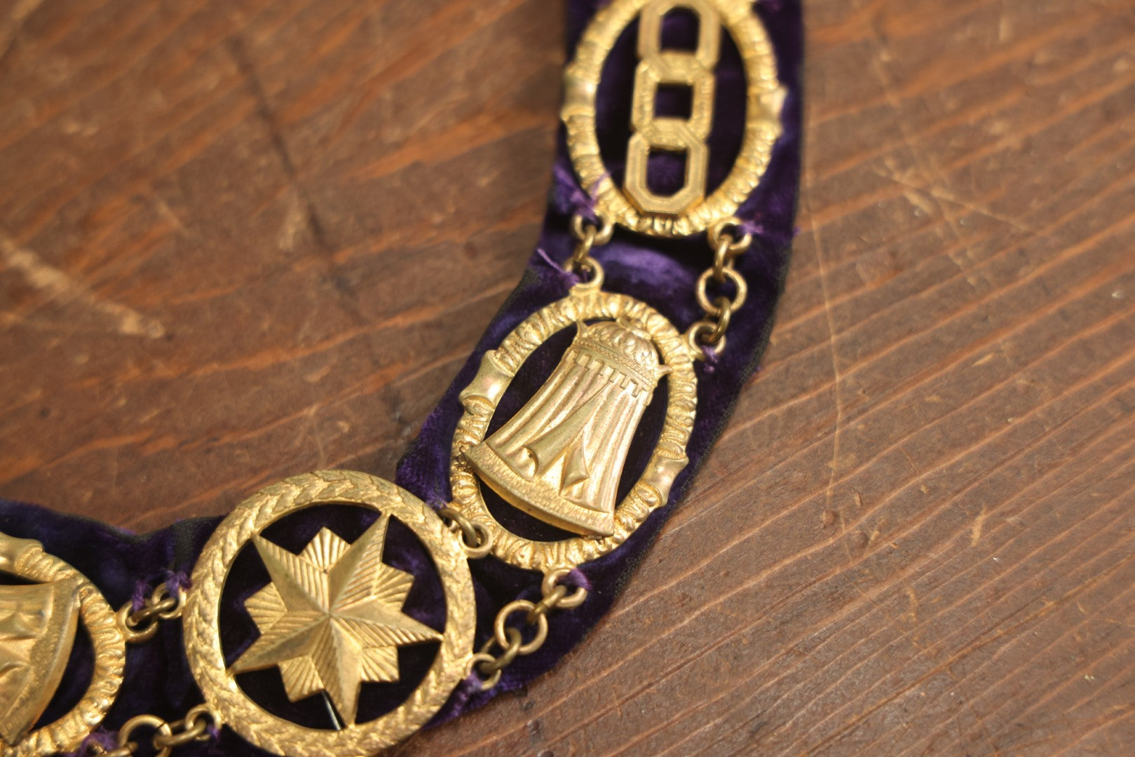 Lot 055 - Antique Odd Fellows I.O.O.F. Purple Chain Collar With Many Symbols Including Three Links And Heart In Hand, With Single Staff Medallion, By Harding Uniform & Regalia Company, Boston