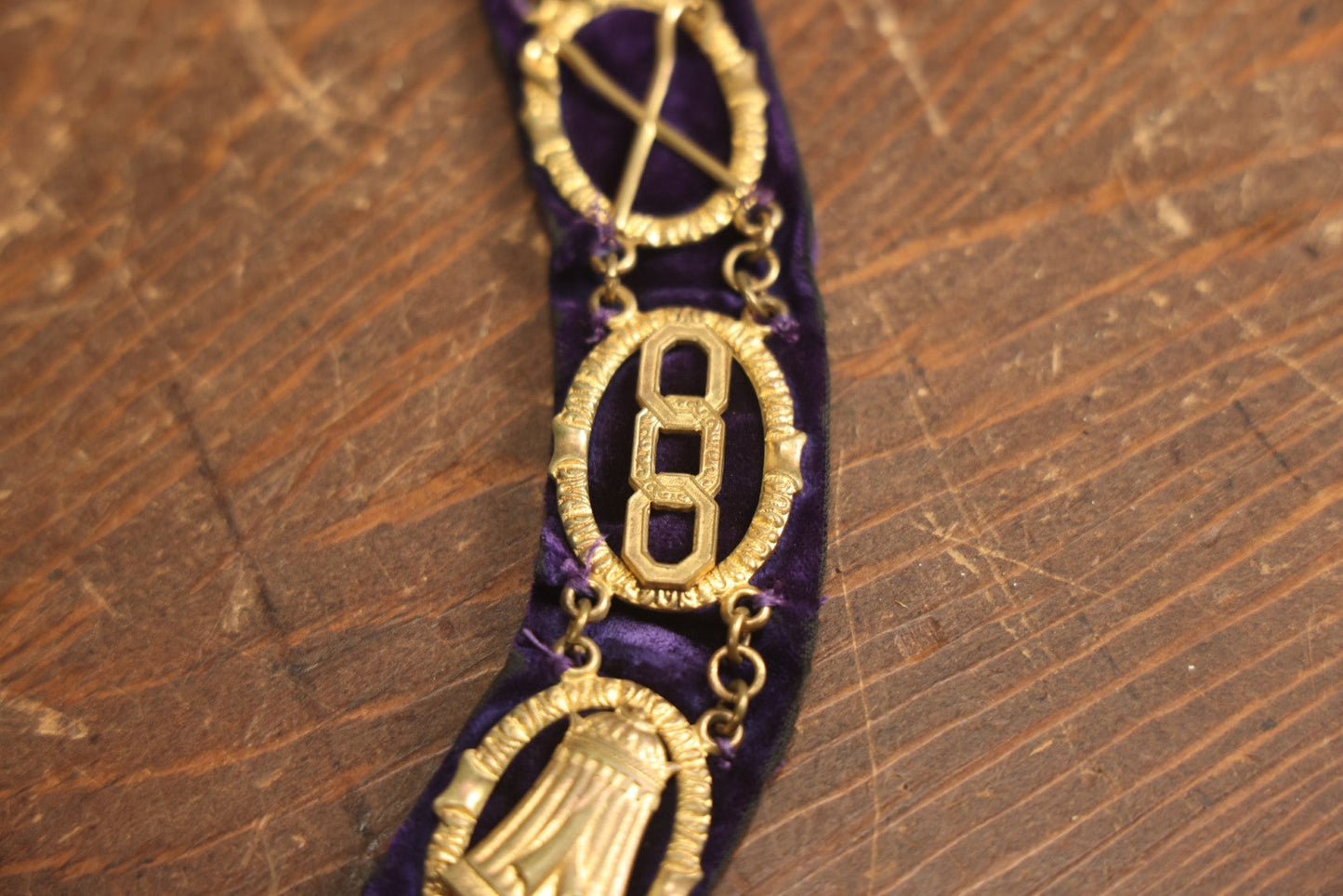 Lot 055 - Antique Odd Fellows I.O.O.F. Purple Chain Collar With Many Symbols Including Three Links And Heart In Hand, With Single Staff Medallion, By Harding Uniform & Regalia Company, Boston