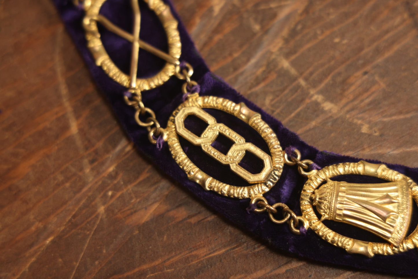 Lot 056 - Antique Odd Fellows I.O.O.F. Purple Chain Collar With Many Symbols Including Three Links And Heart In Hand, With Spear Medallion, By Harding Uniform & Regalia Company, Boston