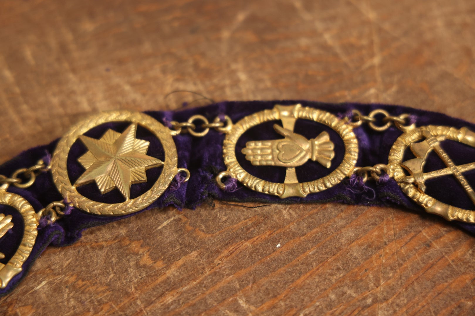 Lot 056 - Antique Odd Fellows I.O.O.F. Purple Chain Collar With Many Symbols Including Three Links And Heart In Hand, With Spear Medallion, By Harding Uniform & Regalia Company, Boston