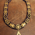 Lot 057 - Antique Odd Fellows I.O.O.F. Purple Chain Collar With Many Symbols Including Three Links And Heart In Hand, With Battle Axe Medallion, By Harding Uniform & Regalia Company, Boston
