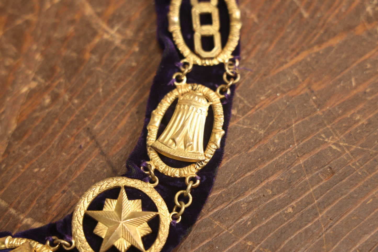 Lot 057 - Antique Odd Fellows I.O.O.F. Purple Chain Collar With Many Symbols Including Three Links And Heart In Hand, With Battle Axe Medallion, By Harding Uniform & Regalia Company, Boston