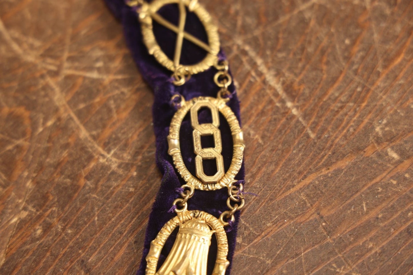 Lot 057 - Antique Odd Fellows I.O.O.F. Purple Chain Collar With Many Symbols Including Three Links And Heart In Hand, With Battle Axe Medallion, By Harding Uniform & Regalia Company, Boston