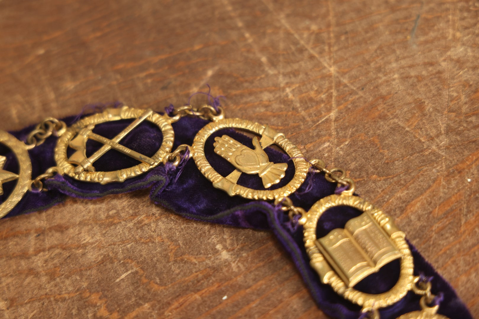 Lot 057 - Antique Odd Fellows I.O.O.F. Purple Chain Collar With Many Symbols Including Three Links And Heart In Hand, With Battle Axe Medallion, By Harding Uniform & Regalia Company, Boston