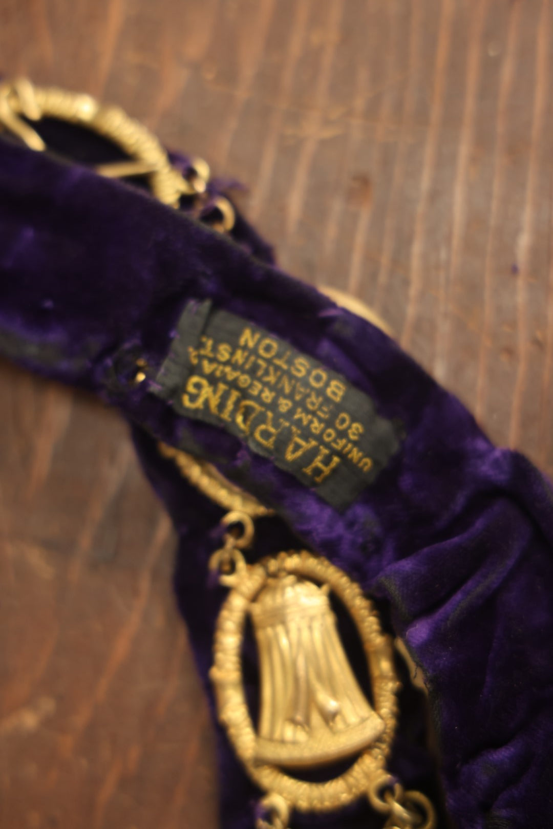 Lot 057 - Antique Odd Fellows I.O.O.F. Purple Chain Collar With Many Symbols Including Three Links And Heart In Hand, With Battle Axe Medallion, By Harding Uniform & Regalia Company, Boston