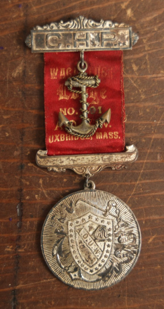 Lot 058 - Antique Ancient Order Of United Workmen A.O.U.M. Ribbon And Medallion, Wacantuck Lodge No 191, Uxbridge, Massachusetts, C.H.P., With Anchor Charm, By The Boston Regalia Company, Missing Pin