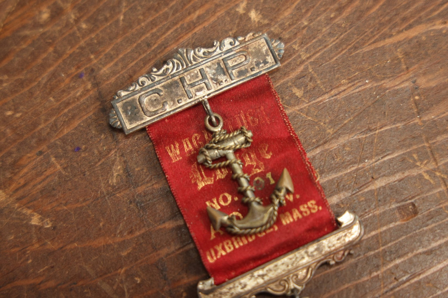 Lot 058 - Antique Ancient Order Of United Workmen A.O.U.M. Ribbon And Medallion, Wacantuck Lodge No 191, Uxbridge, Massachusetts, C.H.P., With Anchor Charm, By The Boston Regalia Company, Missing Pin