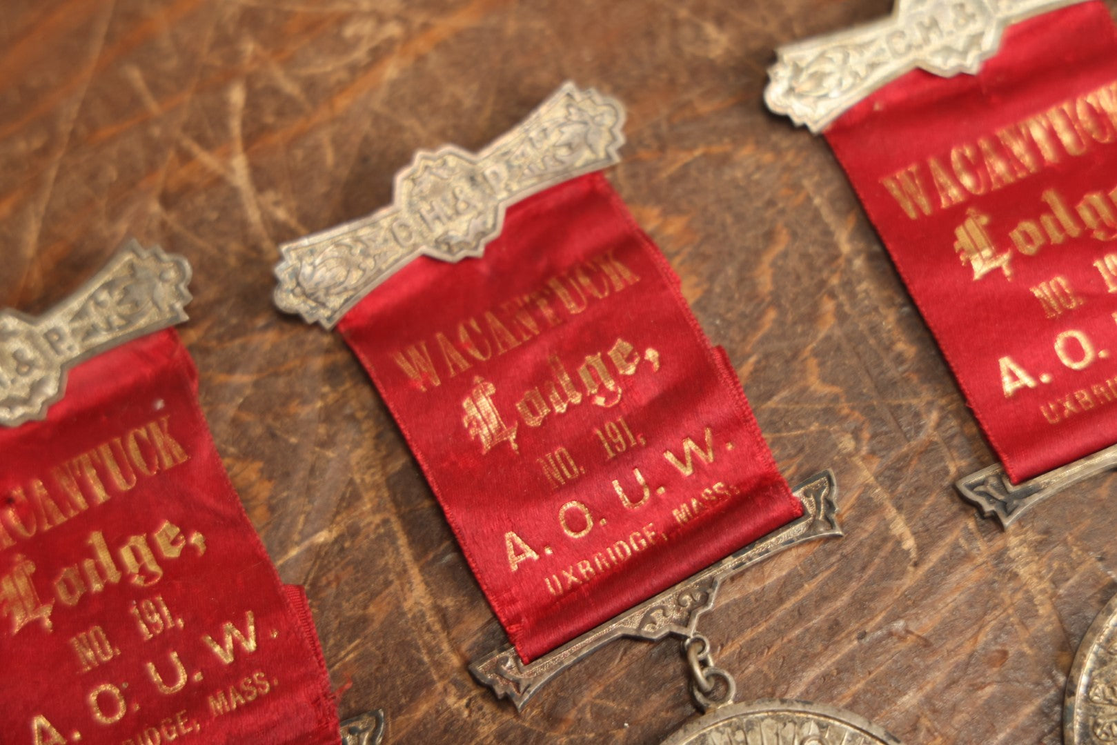 Lot 061 - Grouping Of Three Antique Ancient Order Of United Workmen A.O.U.M. Ribbons And Medallions, Wacantuck Lodge No 191, Uxbridge, Massachusetts, C.H.P., By The Boston Regalia Company