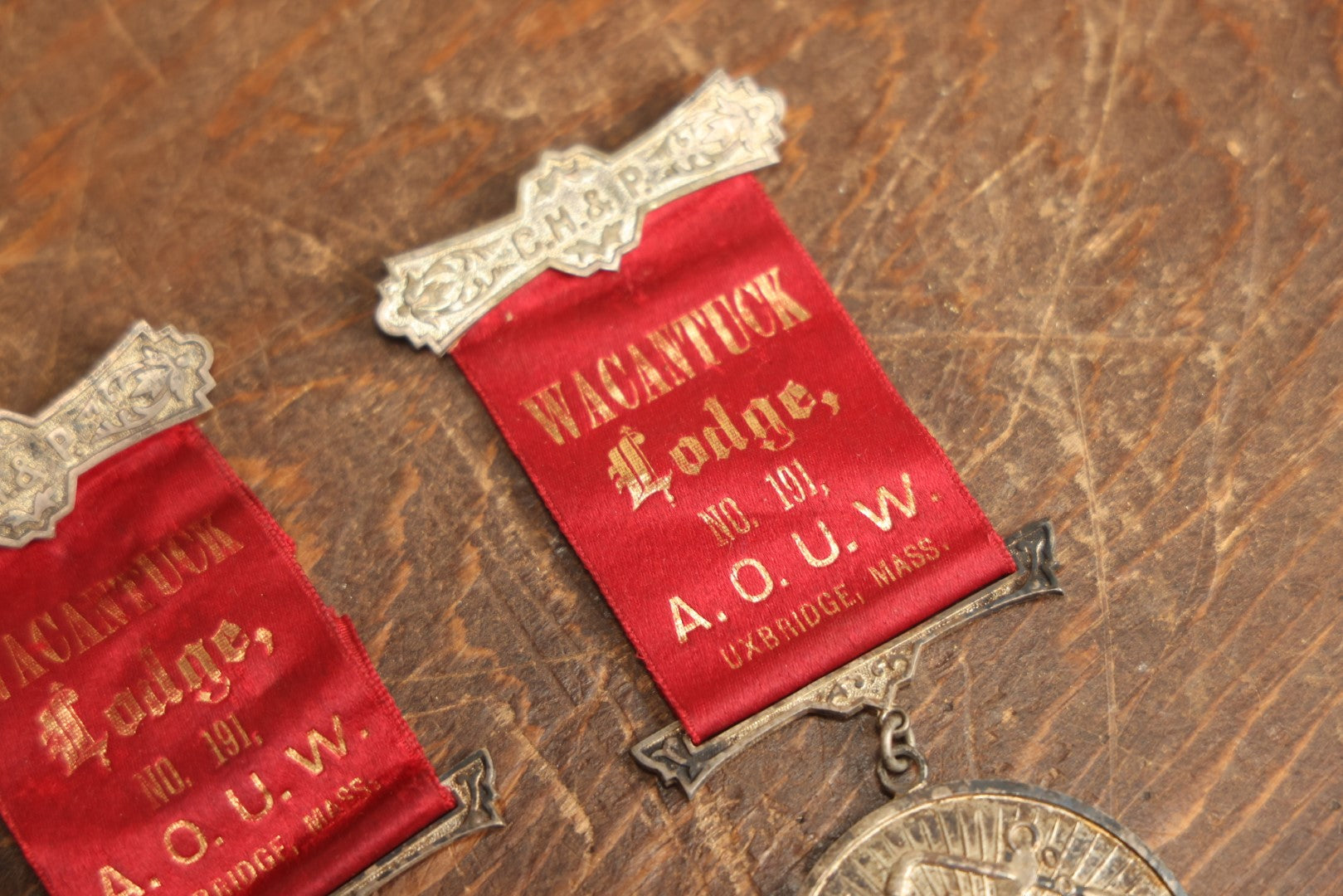 Lot 061 - Grouping Of Three Antique Ancient Order Of United Workmen A.O.U.M. Ribbons And Medallions, Wacantuck Lodge No 191, Uxbridge, Massachusetts, C.H.P., By The Boston Regalia Company