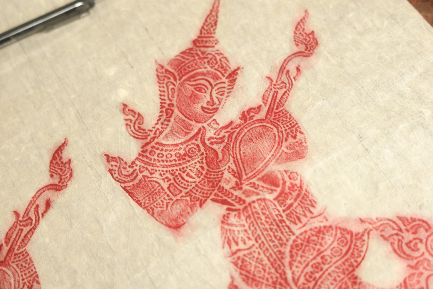 Lot 071 - Pair Of Vintage Thai Buddhist Temple Rubbings Of Dancers, Red On Rice Paper