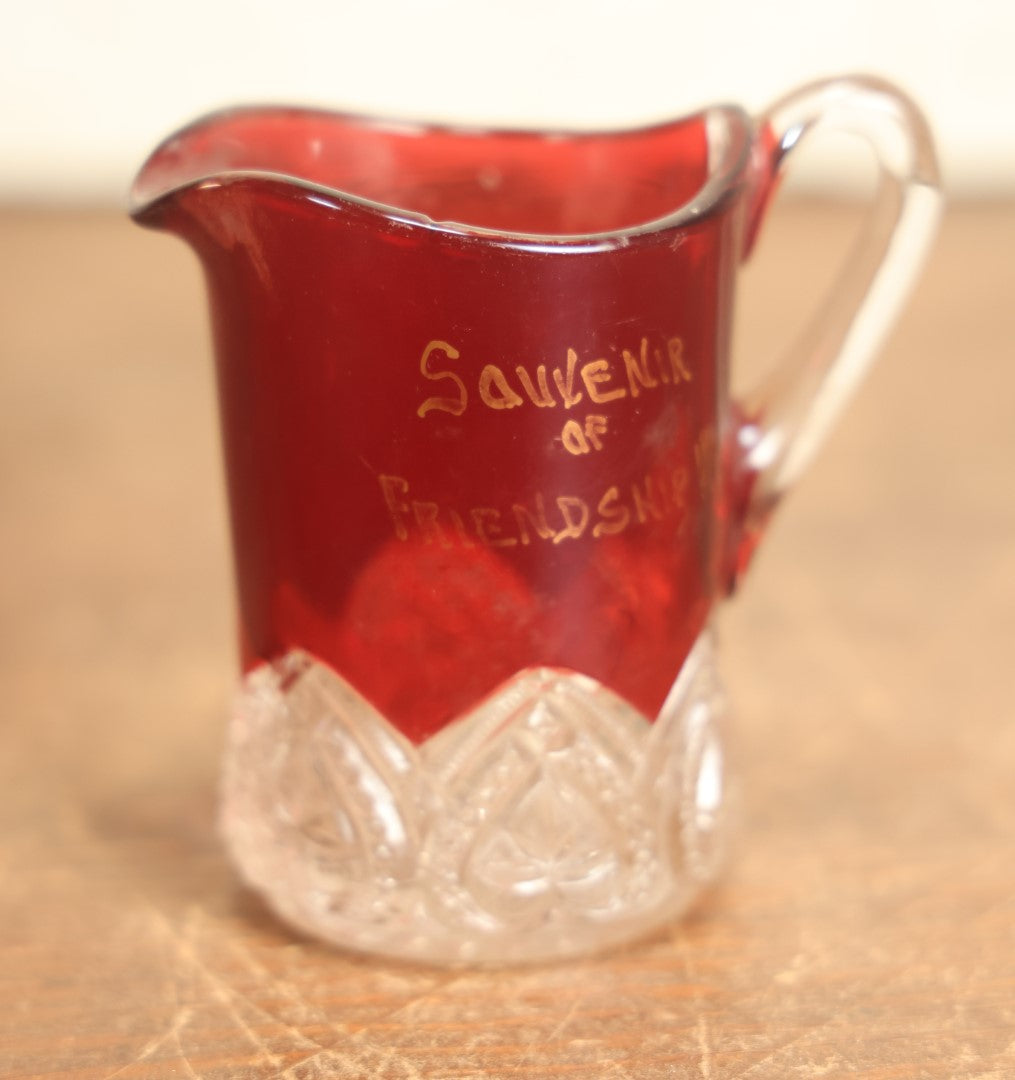 Lot 080 - Antique E.A.P.G. Early American Pattern Glass Red And Clear Syrup Or Creamer, Souvenir Of Friendship, Wisconsin