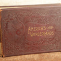 Lot 087 - "America's Wonderlands, A Pictorial And Descriptive History Of Our Country's Scenic Marvels" Antique Photography Book By J.W. Buel, With More Than 500 Photos, Copyright 1893, Note Heavy Wear, Binding Issues