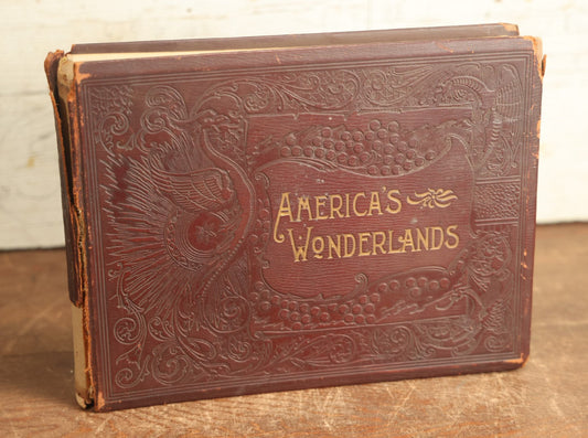 Lot 087 - "America's Wonderlands, A Pictorial And Descriptive History Of Our Country's Scenic Marvels" Antique Photography Book By J.W. Buel, With More Than 500 Photos, Copyright 1893, Note Heavy Wear, Binding Issues