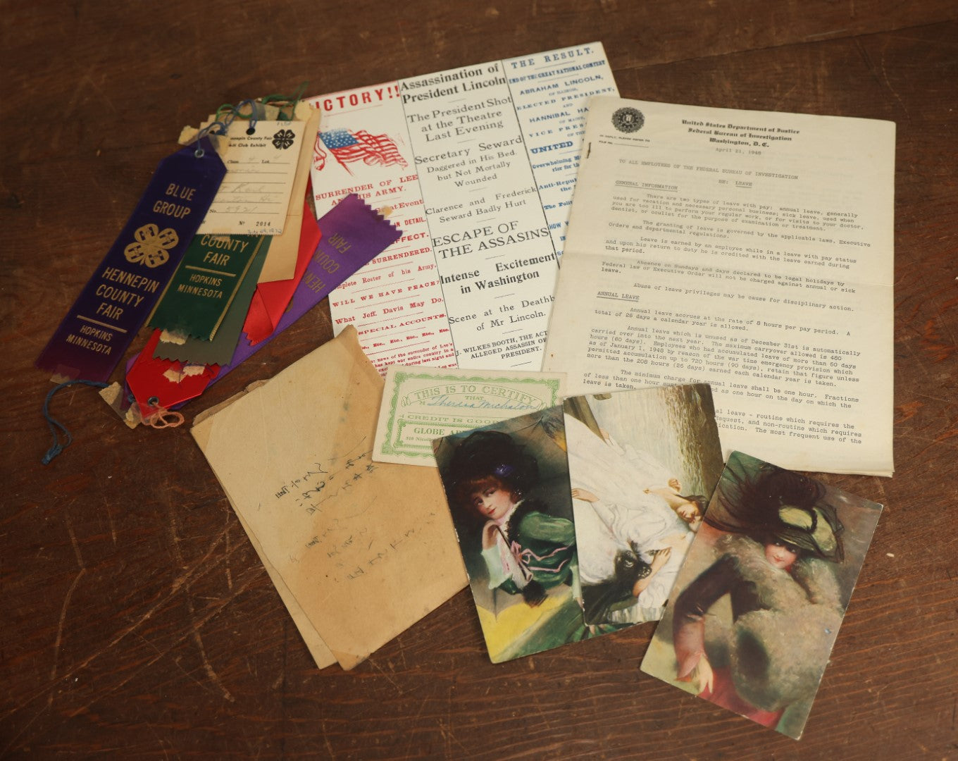 Lot 096 - Assorted Ephemera Grouping Including F.B.I, Memo With Facsimile J. Edgar Hoover Signature, Postcards, 4H Ribbons, Foreign Letter, Abraham Lincoln First Day Issue Stamp, And Apparel Credit Slip 