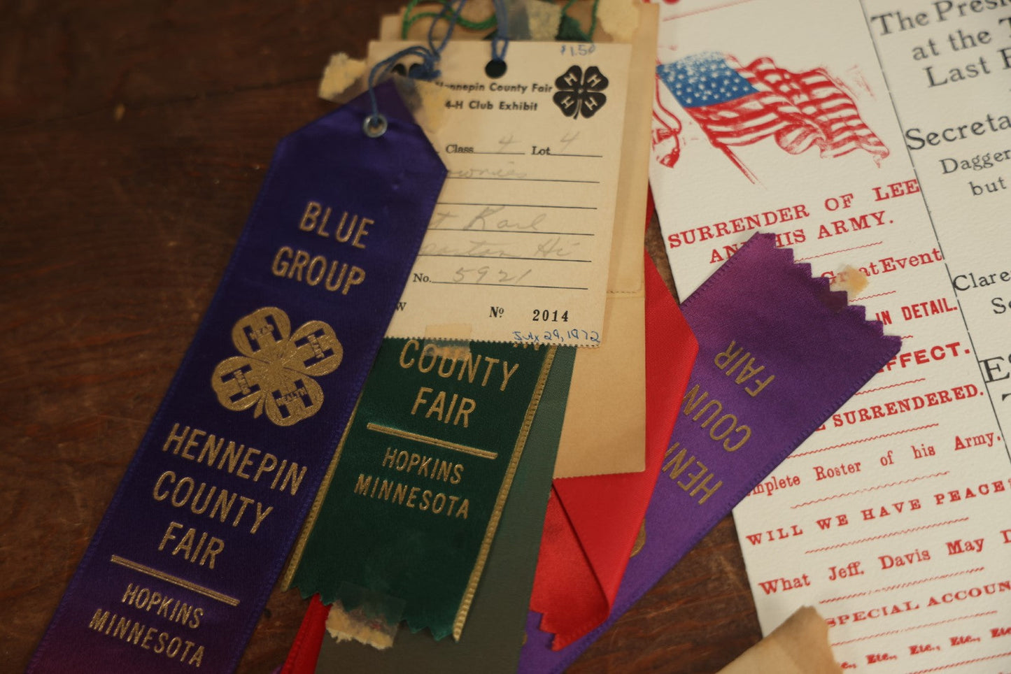 Lot 096 - Assorted Ephemera Grouping Including F.B.I, Memo With Facsimile J. Edgar Hoover Signature, Postcards, 4H Ribbons, Foreign Letter, Abraham Lincoln First Day Issue Stamp, And Apparel Credit Slip 