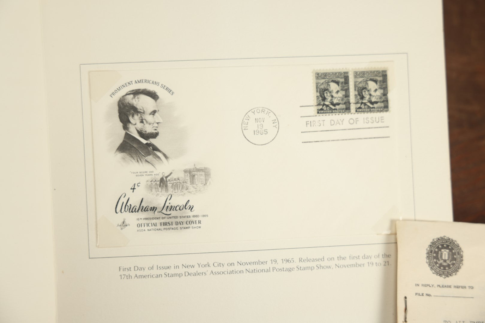 Lot 096 - Assorted Ephemera Grouping Including F.B.I, Memo With Facsimile J. Edgar Hoover Signature, Postcards, 4H Ribbons, Foreign Letter, Abraham Lincoln First Day Issue Stamp, And Apparel Credit Slip 