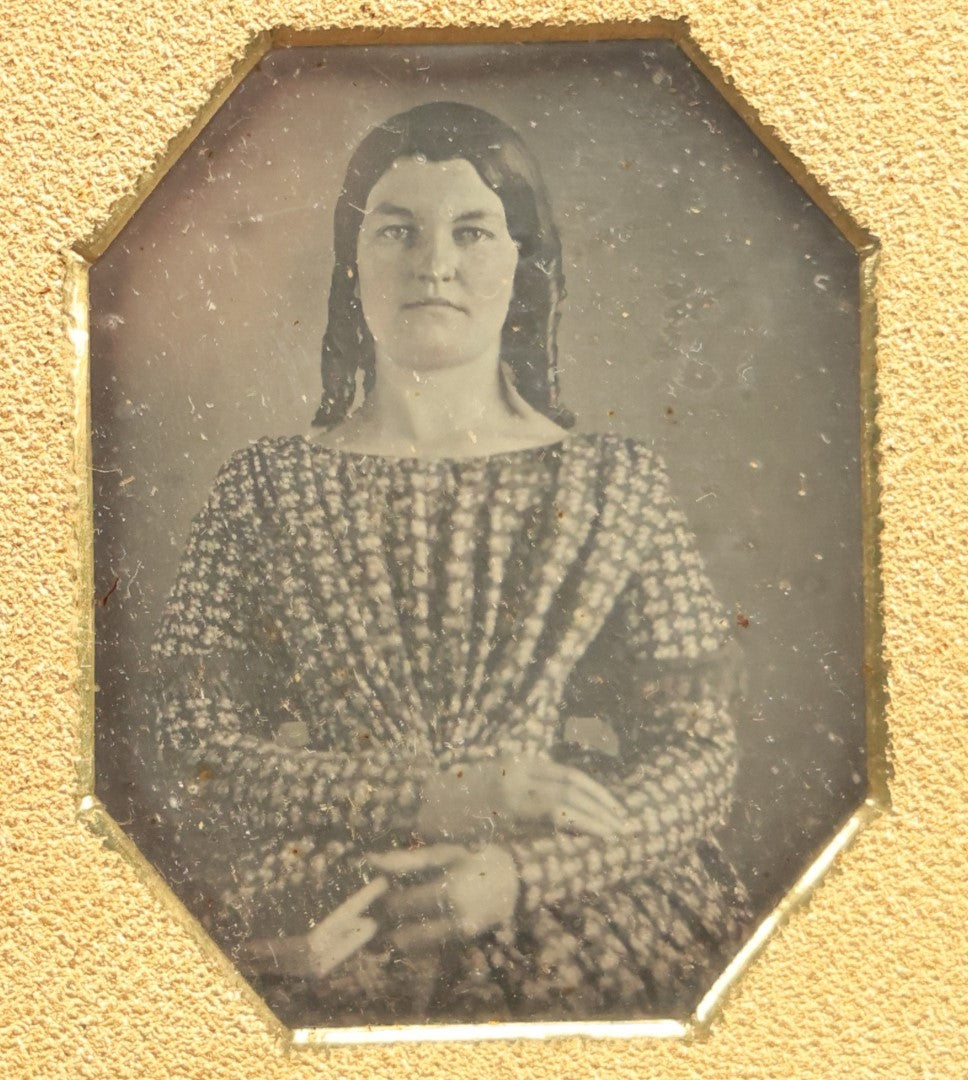 Lot 010 - Antique 1/6th Plate Daguerreotype Photograph Of A Pretty Young Woman With Curls And A Dress Holding A Book, In Half Case, With Octogonal Cut Mat